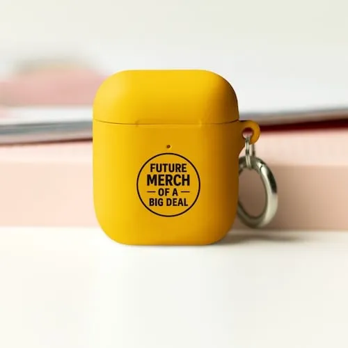 A yellow Airpods case with black text that says Future Merch of a Big Deal representing tech accessory promotional products available in our store for same-day online ordering in Austin .